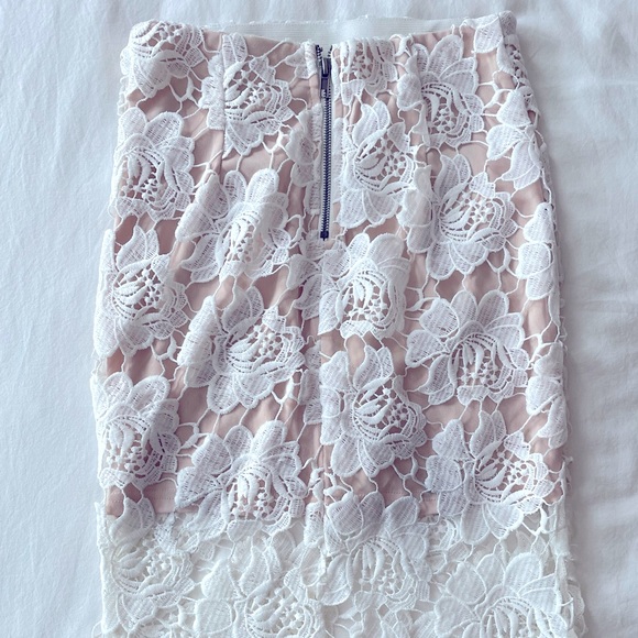 Rumor Boutique A-symmetrical nude mini skirt with eyelet overlay. Size Small - Picture 3 of 4